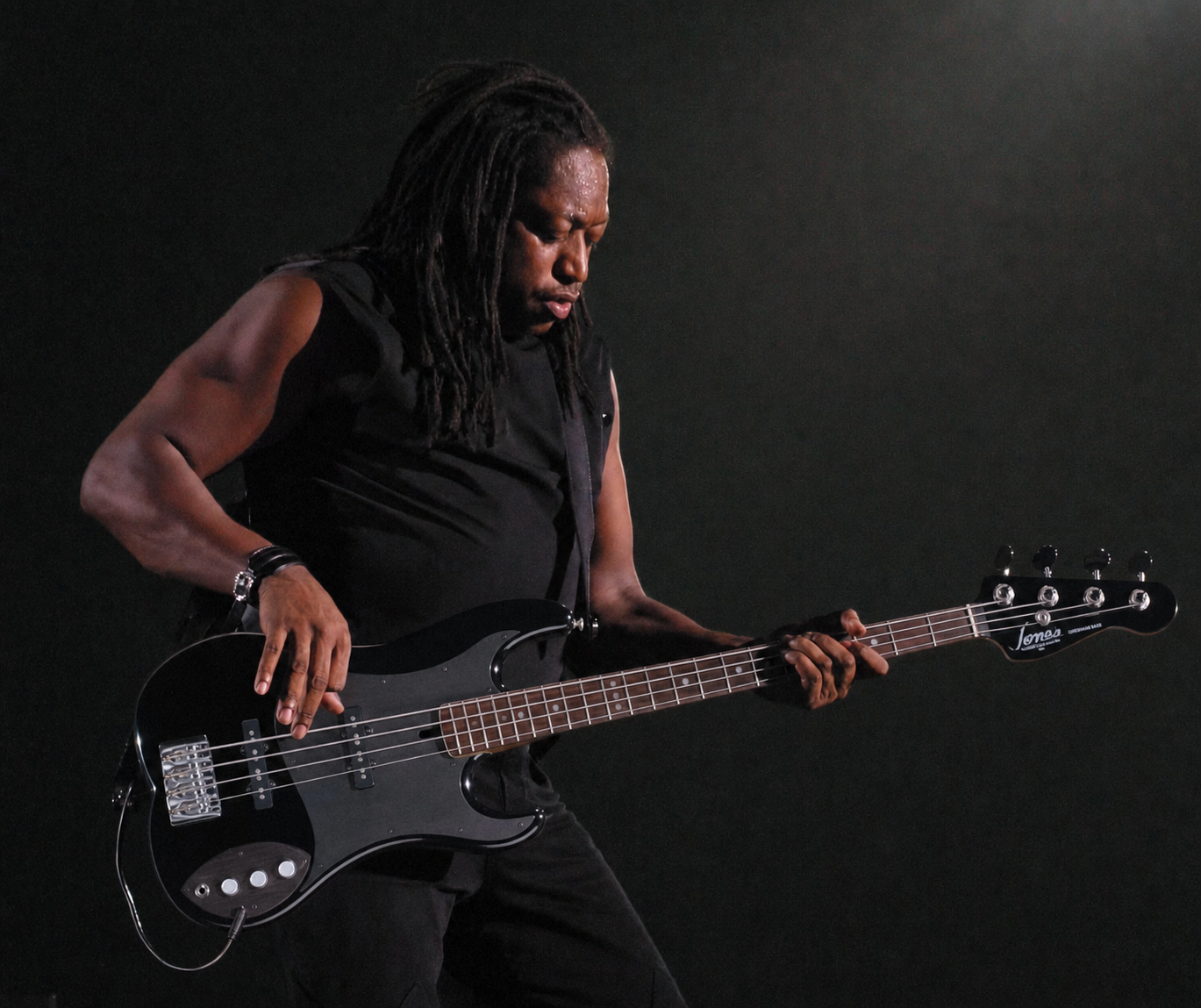 Darryl Jones on stage playing his black Jones Gresham bass